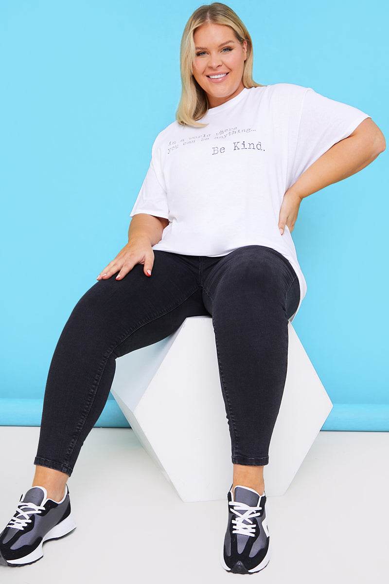 IN A WORLD WHERE YOU CAN BE ANYTHING BE KIND' T-SHIRT