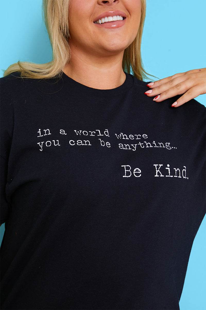 IN A WORLD WHERE YOU CAN BE ANYTHING BE KIND' T-SHIRT