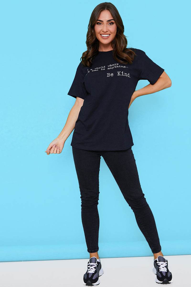 IN A WORLD WHERE YOU CAN BE ANYTHING BE KIND' T-SHIRT