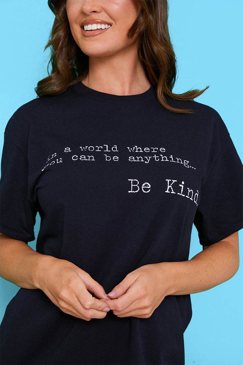 IN A WORLD WHERE YOU CAN BE ANYTHING BE KIND' T-SHIRT