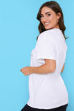 IN A WORLD WHERE YOU CAN BE ANYTHING BE KIND' T-SHIRT